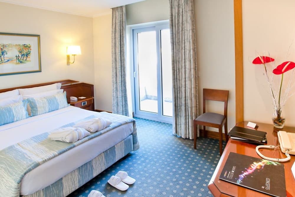 Quarto Hotel Sana Rex 2024